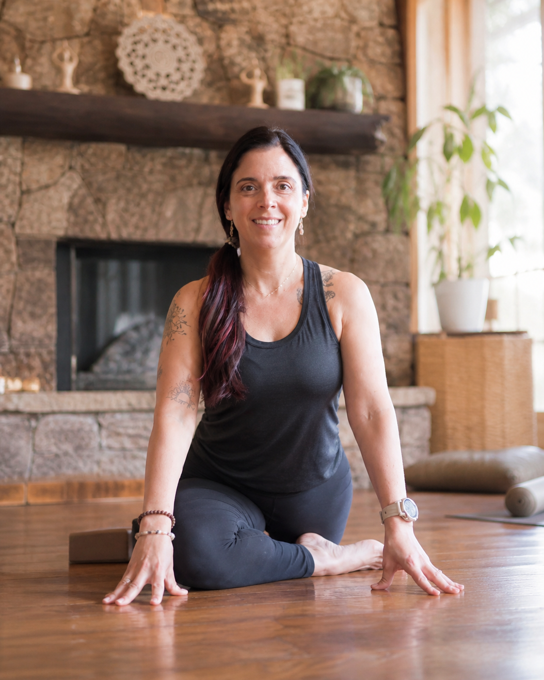 Heather Blackmon practicing yoga at home