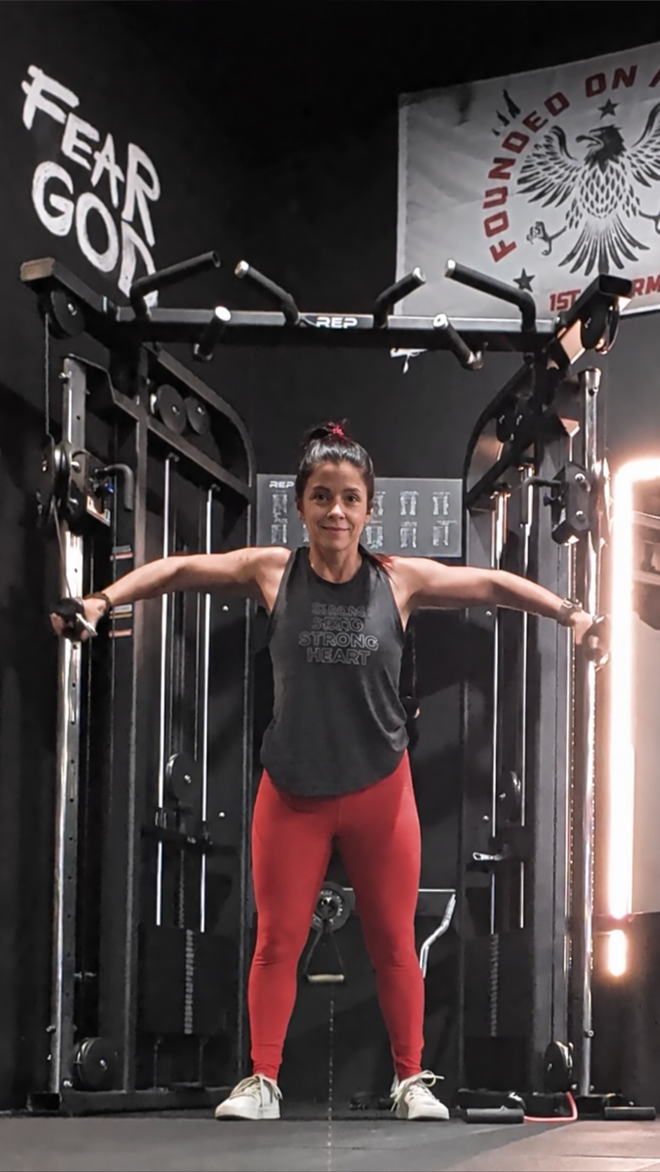Heather Blackmon strength training on a cable machine